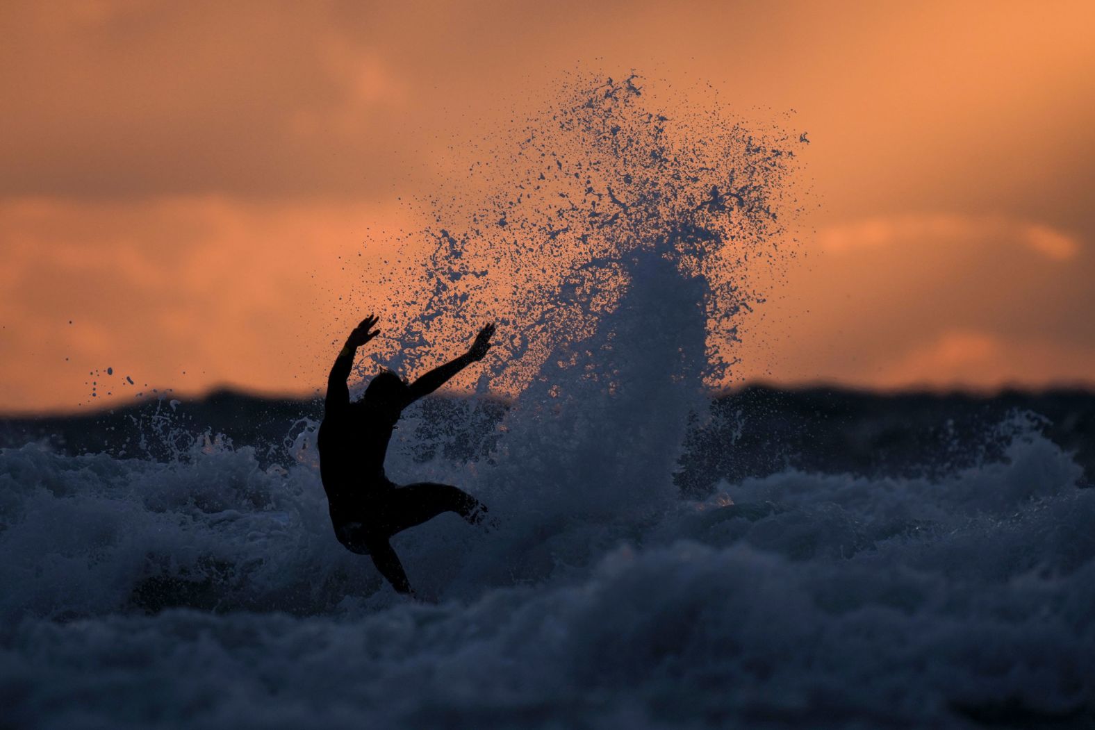 A professional surfer takes part in a Surf League event in Netanya, Israel, on Tuesday, March 15.