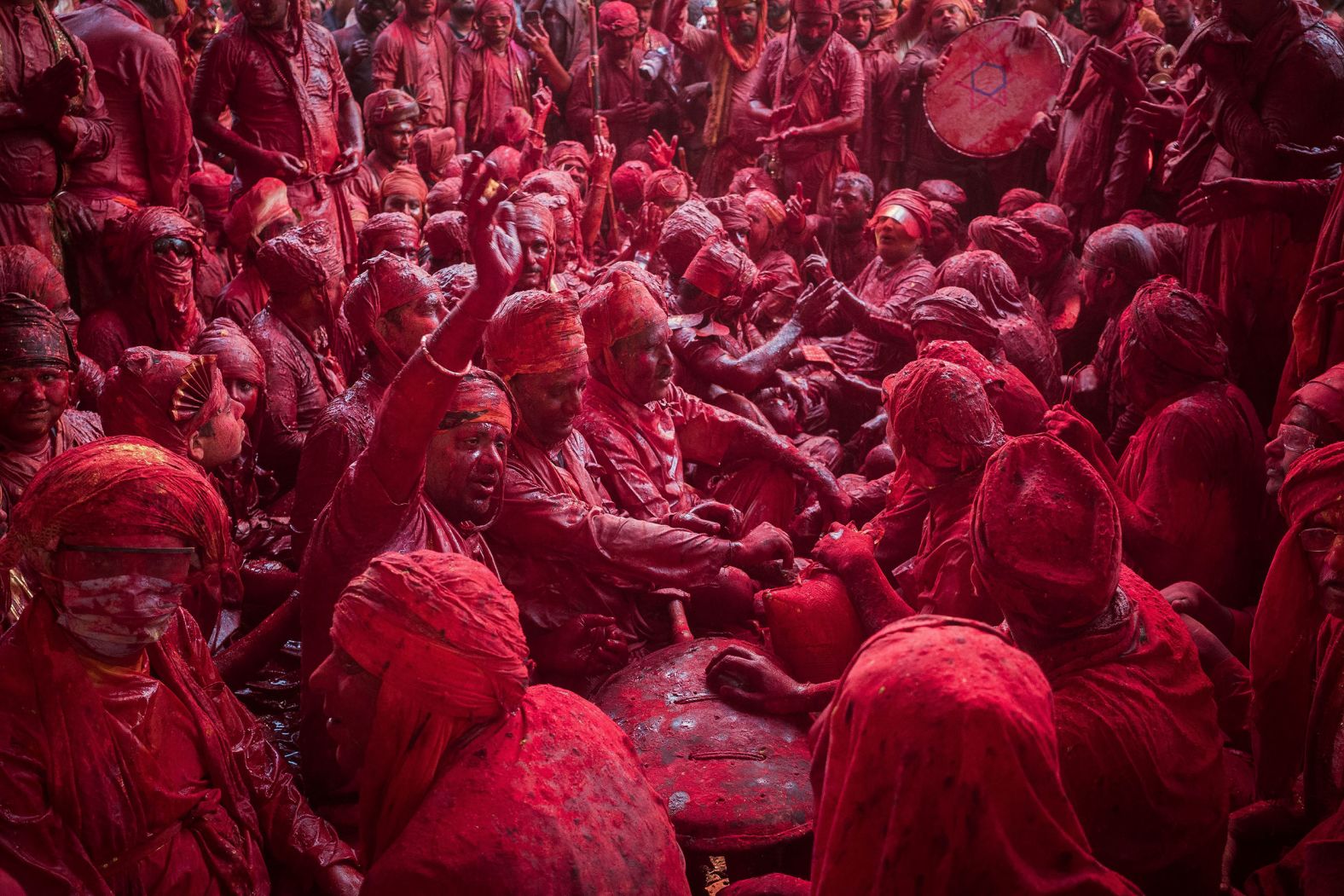 Revelers sing hymns at the Radha Rani temple as they take part in Holi celebrations in the Indian village of Barsana on Friday, March 11. The Holi festival of colors is a Hindu celebration marking the arrival of spring.