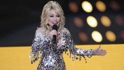 Host Dolly Parton speaks at the 57th Academy of Country Music Awards on Monday, March 7, 2022, at Allegiant Stadium in Las Vegas. (AP Photo/John Locher)