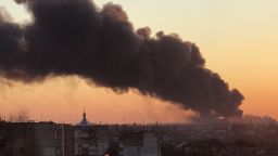 A cloud of smoke raises after an explosion in Lviv, western Ukraine, Friday, March 18, 2022. The mayor of Lviv says missiles struck near the city's airport early Friday.