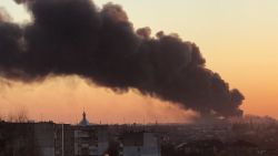 A cloud of smoke raises after an explosion in Lviv, western Ukraine, Friday, March 18, 2022. The mayor of Lviv says missiles struck near the city's airport early Friday.