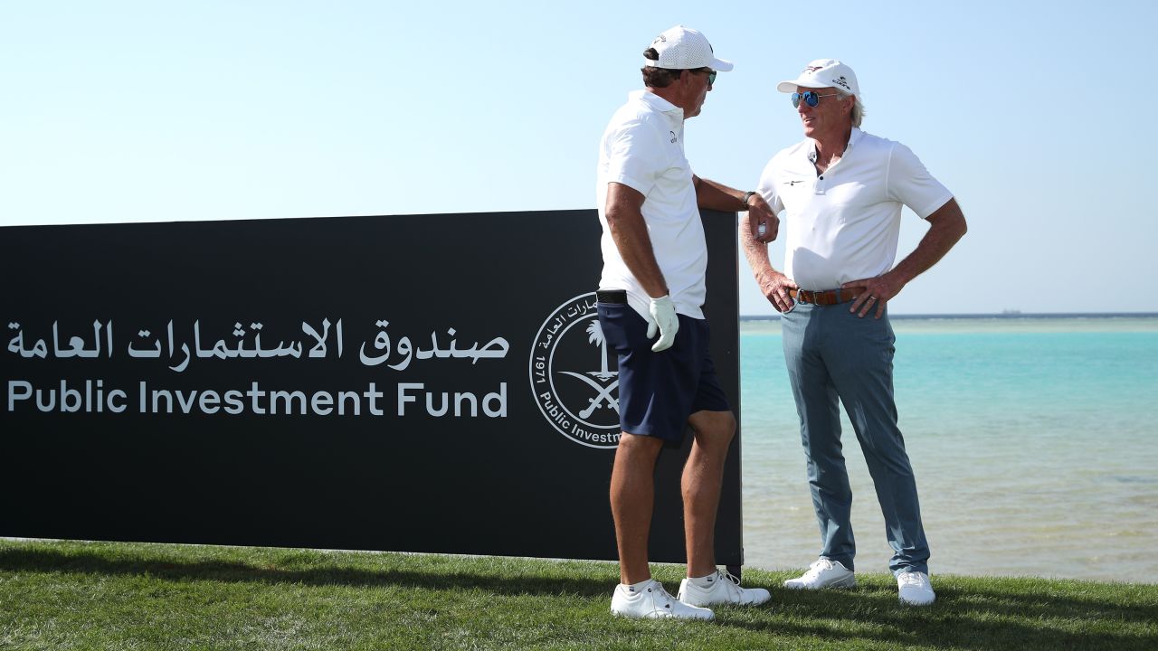 Phil Mickelson and Norman talk during a practice round prior to the PIF Saudi International.