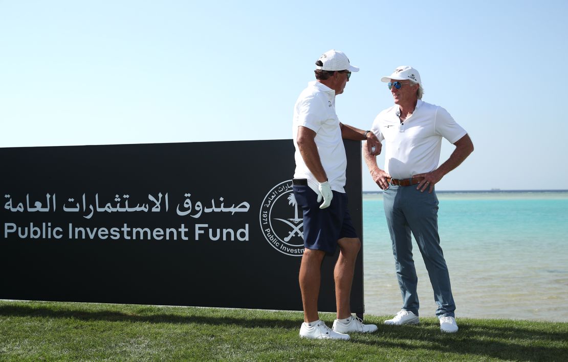 Phil Mickelson and Norman talk during a practice round prior to the PIF Saudi International.