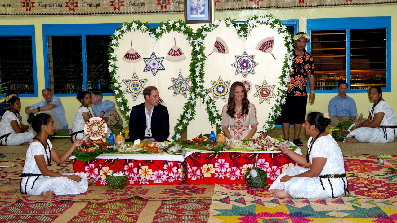 William and Kate attend a traditional dinner in Funafuti, Tuvalu during the couple's Diamond Jubilee tour of the Far East in September 2012.