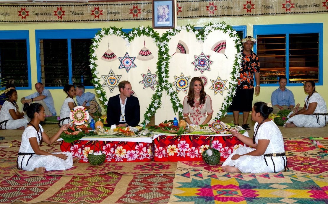 William and Kate attend a traditional dinner in Funafuti, Tuvalu during the couple's Diamond Jubilee tour of the Far East in September 2012.