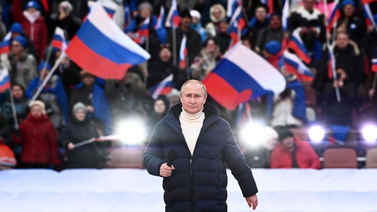 Russian President Vladimir Putin attends a concert marking the eighth anniversary of Russia's annexation of Crimea at the Luzhniki stadium in Moscow on March 18, 2022. 