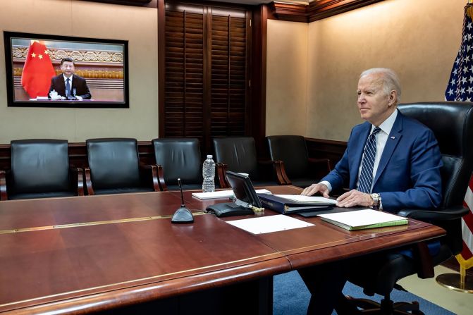 US President Joe Biden holds a virtual meeting with Chinese President Xi Jinping in this photo that was released by the White House on March 18. Biden sought to use <a href="index.php?page=&url=https%3A%2F%2Fwww.cnn.com%2F2022%2F03%2F18%2Fpolitics%2Fjoe-biden-xi-jinping-call%2Findex.html" target="_blank">the 110-minute call</a> to dissuade Xi from assisting Russia in its war on Ukraine.