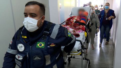 One of the boys is taken into the ICU at a hospital in Manaus, Brazil on Thursday.