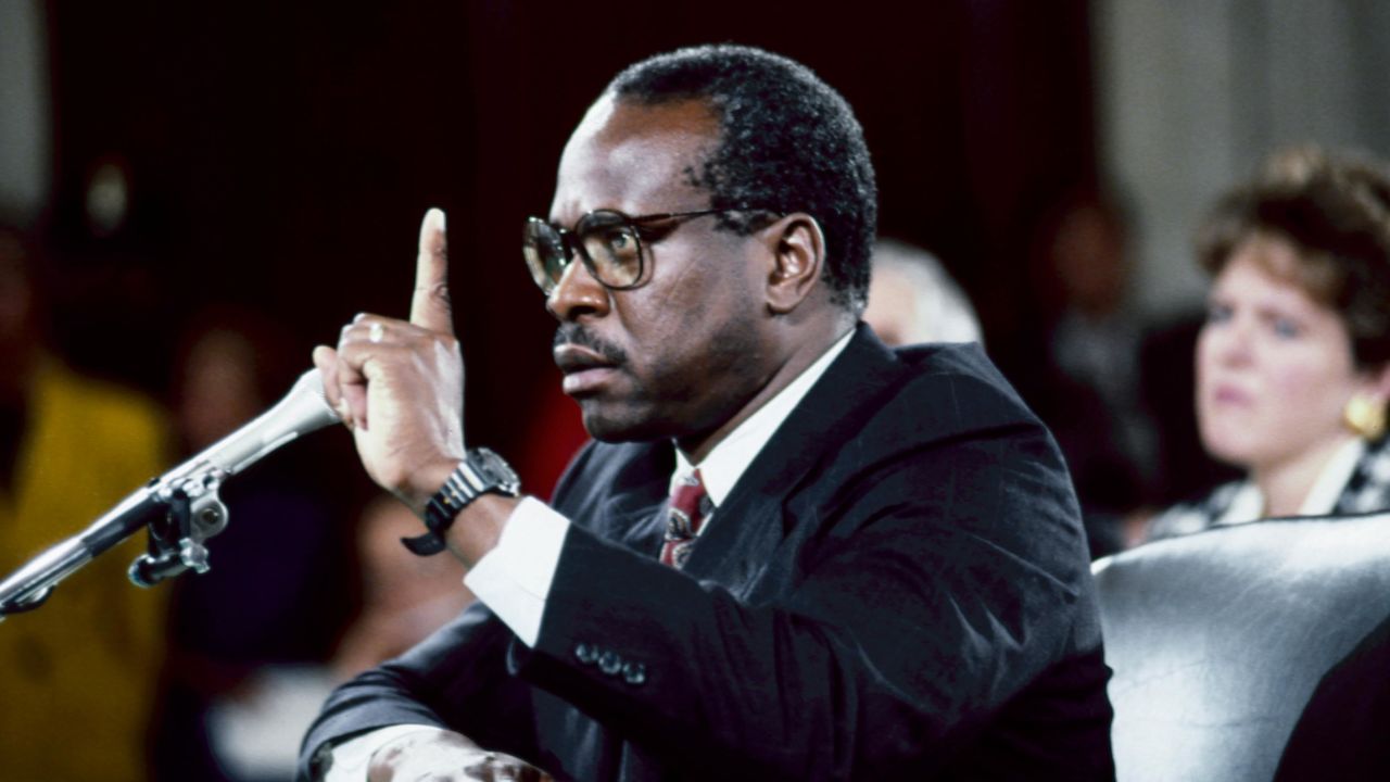 Clarence Thomas, then nominee for Supreme Court associate justice, responds to questions from members of the Senate Judiciary Committee during his confirmation hearing in October 1991. 