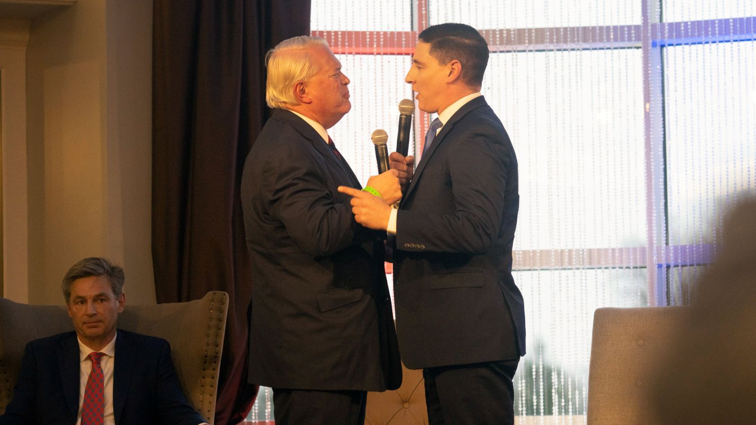 Ohio Republican Senate candidates Mike Gibbons, left, and Josh Mandel argue at a debate in Gahanna, Ohio, on March 18, 2022.