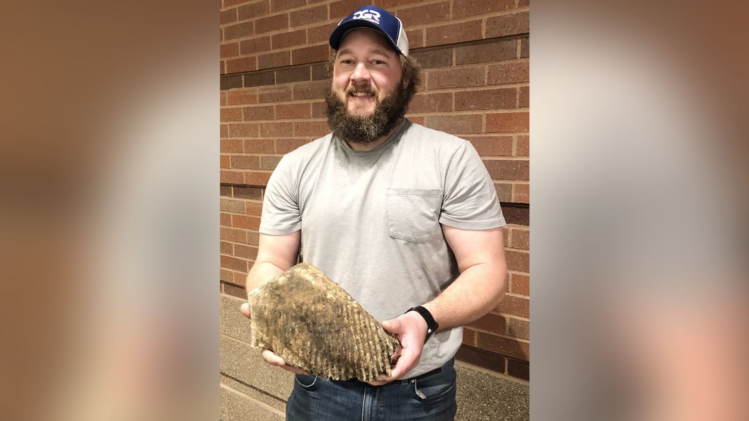 Justin Blauwet, a construction worker, discovered the 11-pound wooly mammoth tooth while observing a construction site in Sheldon, Iowa. 