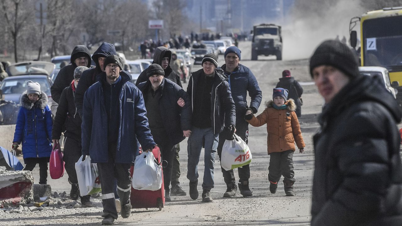 Residents leave the city of Mariupol which has seen intense fighting in recent weeks.