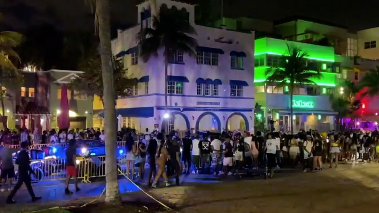 Miami Beach imposed a midnight spring break curfew after two shootings left five people injured.