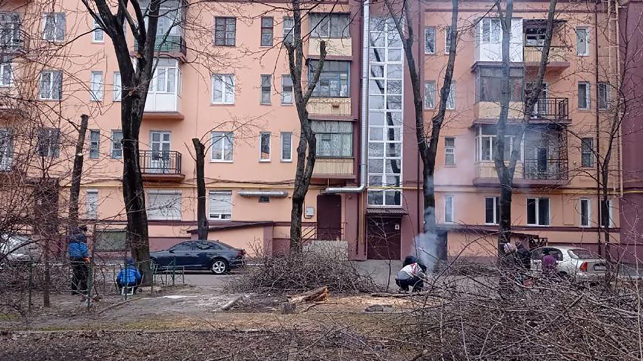 Mariupol residents cooking what food they could find outside their homes.