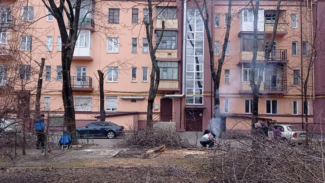 Mariupol residents cooking what food they could find outside their homes.