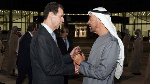 Syrian President Bashar al-Assad (left) speaks with Abu Dhabi's Crown Prince, Sheikh Mohammed bin Zayed Al Nahyan, in Abu Dhabi, United Arab Emirates, on Friday. 