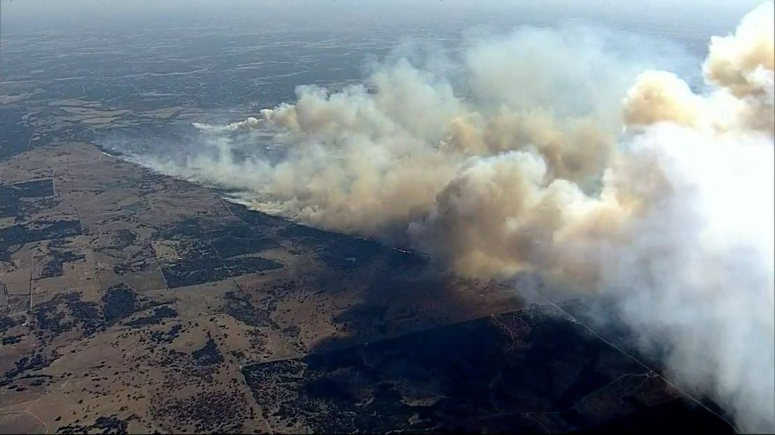 Smoke billows from the Eastland Complex Fire Sunday.