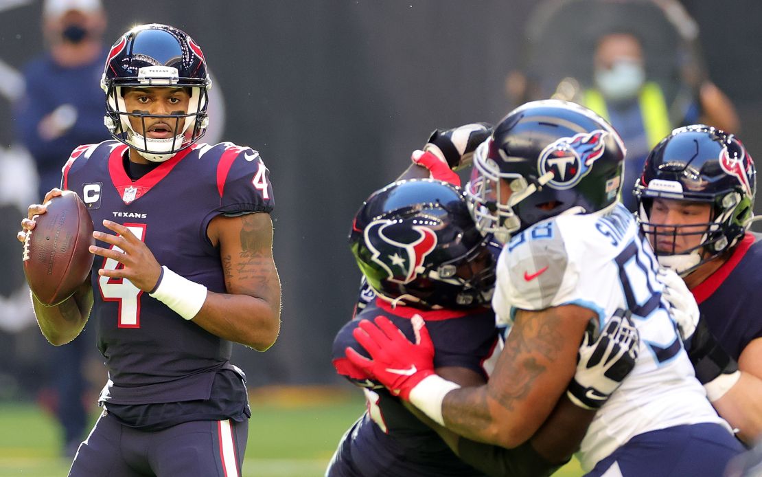 Watson drops back to pass during the first half against the Tennessee Titans at NRG Stadium on January 3, 2021.
