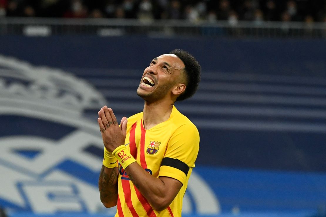 Pierre-Emerick Aubameyang celebrates scoring his team's first goal against Real Madrid. 