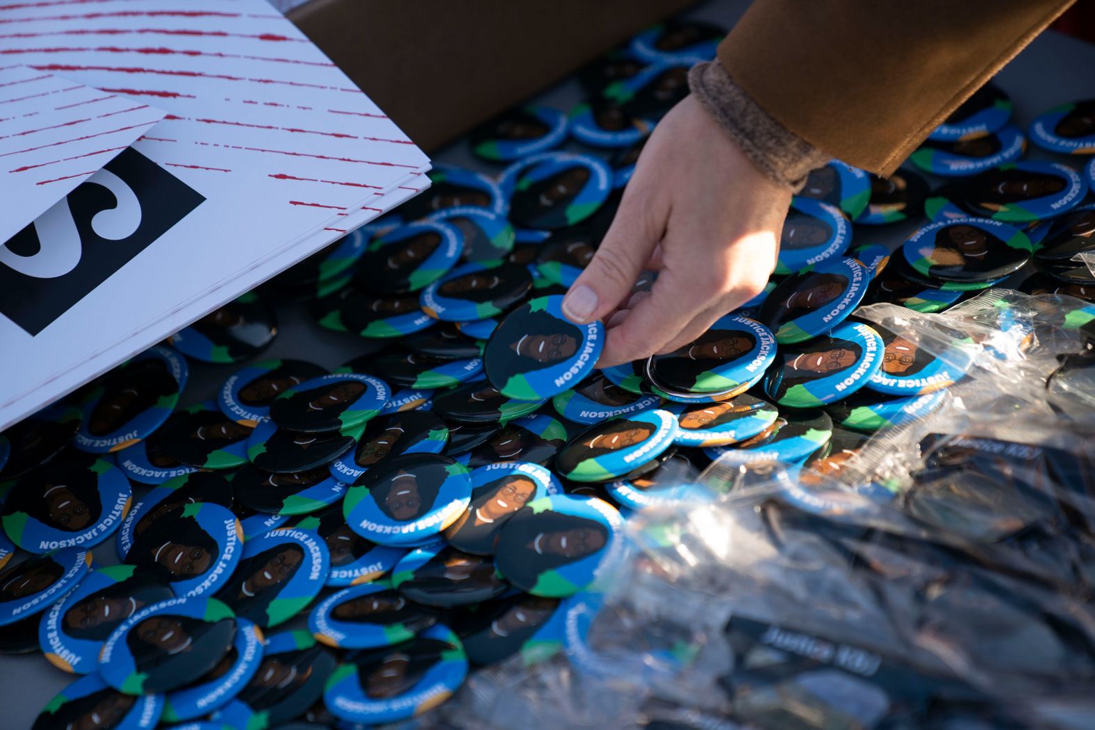Buttons with Jackson's likeness are seen in Washington, DC, on March 21. They were made by Jackson supporters.