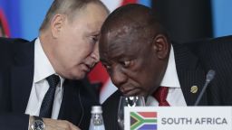Russian President Vladimir Putin, left, speaks to South African President, Cyril Ramaphosa, right, during a plenary session at the Russia-Africa summit in the Black Sea resort of Sochi, Russia on Oct. 24, 2019. Amid a worldwide chorus of condemnation against Russia's war on Ukraine, Africa has remained mostly quiet — a reminder of the Kremlin's considerable influence over the continent. 