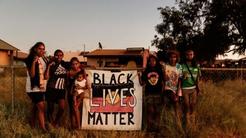 Children from Yuendumu hold a Black Lives Matter sign on March 11, 2022, the day Rolfe was acquitted.