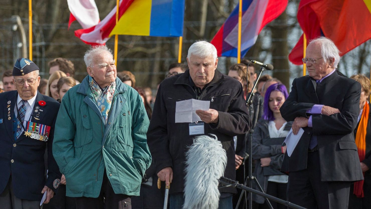 Holocaust survivor Boris Romantschenko (center) stands next to other former prisoners of the Buchenwald Nazi concentration camp during a commemoration ceremony in April, 2015.