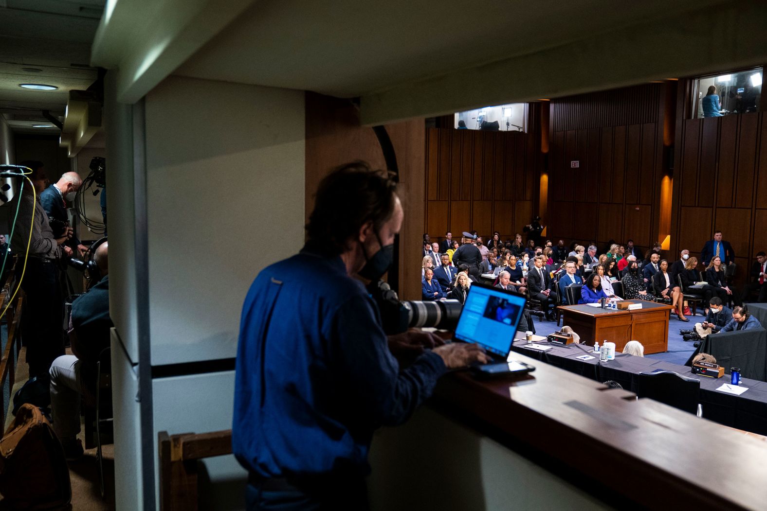 Members of the press report from the hearing on March 21.