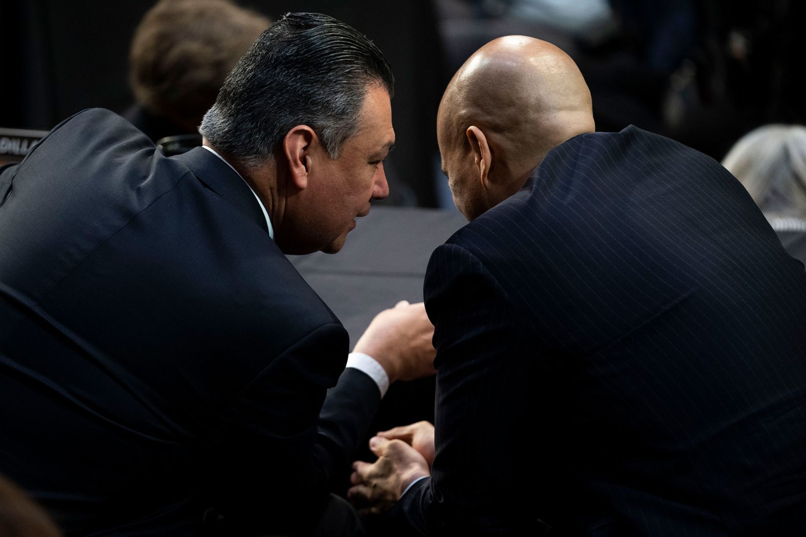 Democratic US Sens. Alex Padilla, left, and Cory Booker speak during opening statements on March 21.