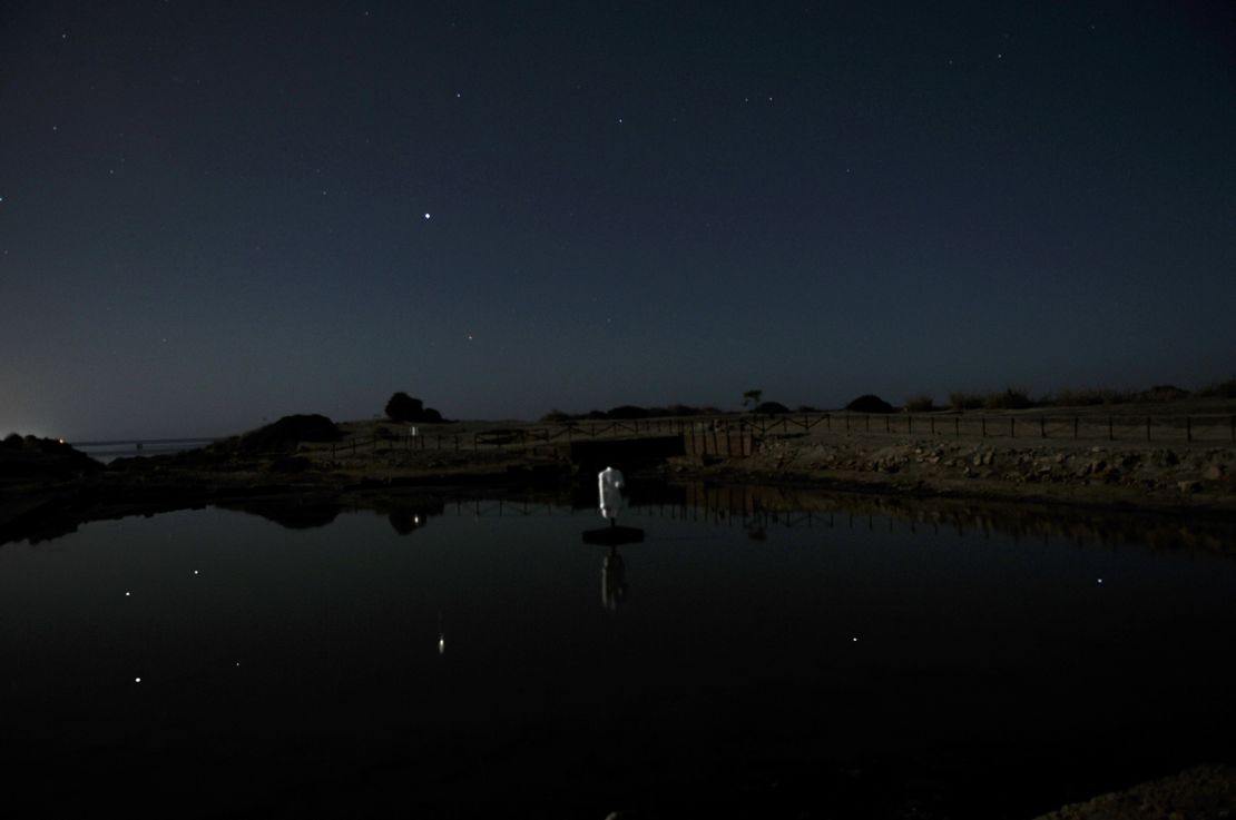 This night view of Motya shows the winter sky mirrored in the freshwater pool.