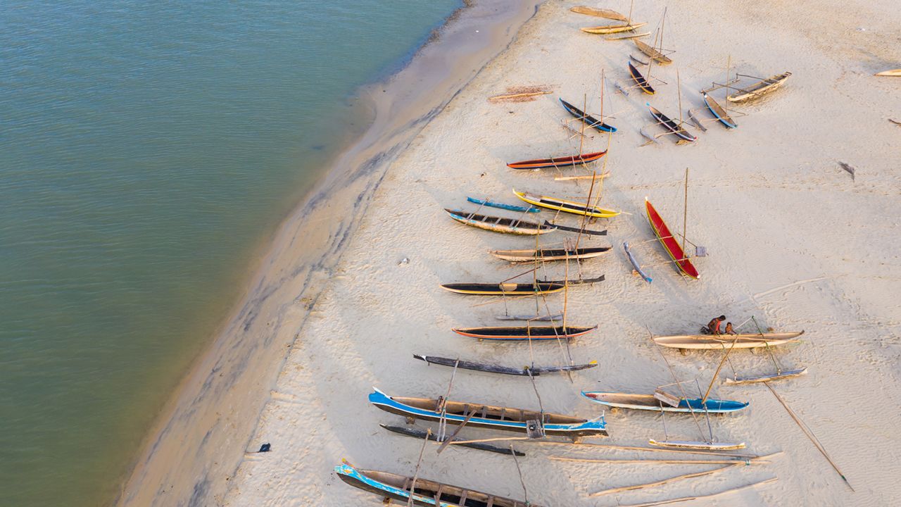 Colorful pirogues line the beach in Morondava, Madagascar.