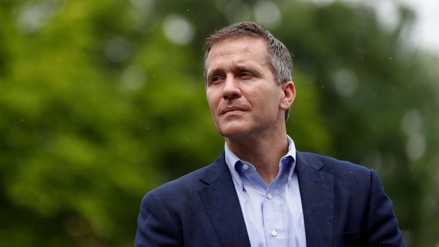 Then-Missouri Gov. Eric Greitens waits to deliver remarks to a small group of supporters near the capitol in Jefferson City, Missouri, in May 2018.