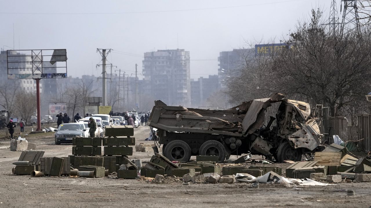 Civilians trapped in Mariupol city under Russian attacks, are evacuated in groups under the control of pro-Russian separatists, through other cities, in Mariupol, Ukraine on March 20, 2022. 