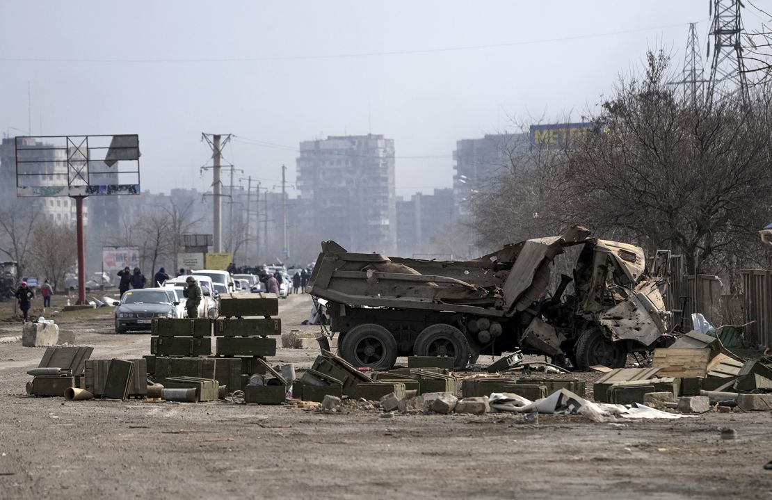 Civilians trapped in Mariupol city under Russian attacks, are evacuated in groups under the control of pro-Russian separatists, through other cities, in Mariupol, Ukraine on March 20, 2022. 