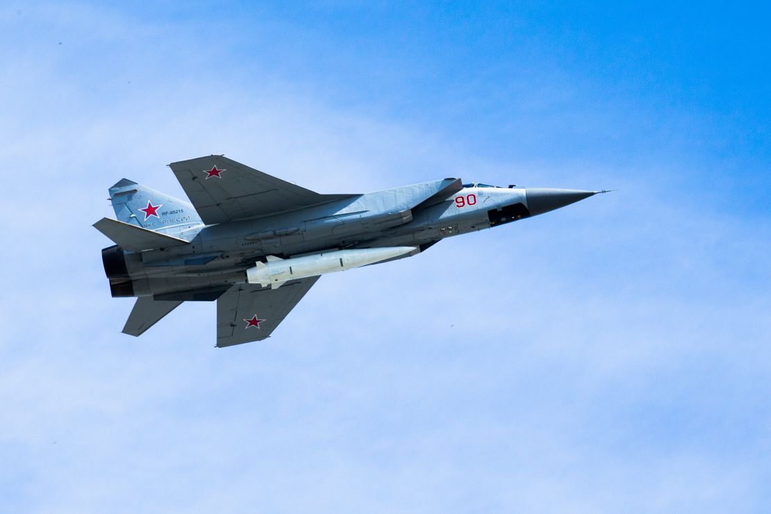 A Russian Air Force MiG-31K jet carries a high-precision hypersonic aero-ballistic missile Kh-47M2 Kinzhal during the Victory Day military parade in Moscow, Russia on May 9, 2018.