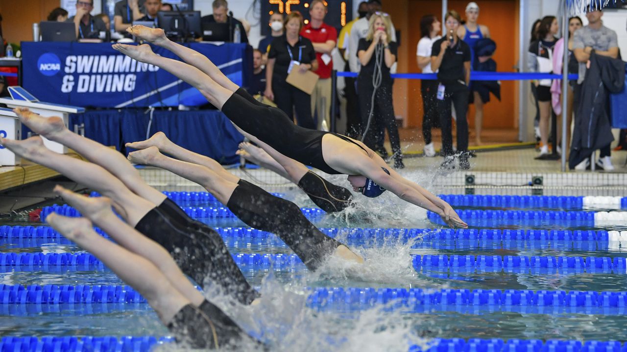 UPenn swimmer Lia Thomas dives during the 100 Freestyle prelims at the NCAA Swimming and Diving Championships on March 19th, 2022 at the McAuley Aquatic Center in Atlanta.