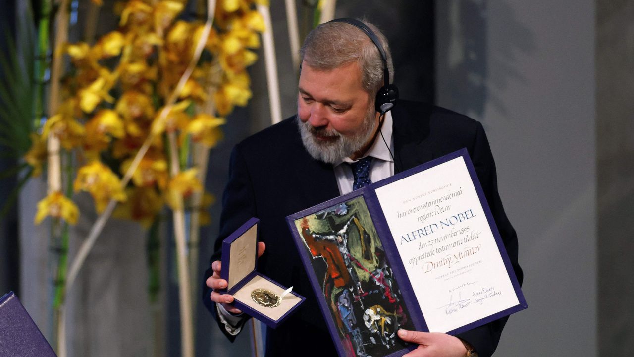Nobel Peace Prize laureate Dmitry Muratov poses during the gala award ceremony on December 10, 2021 in Oslo.