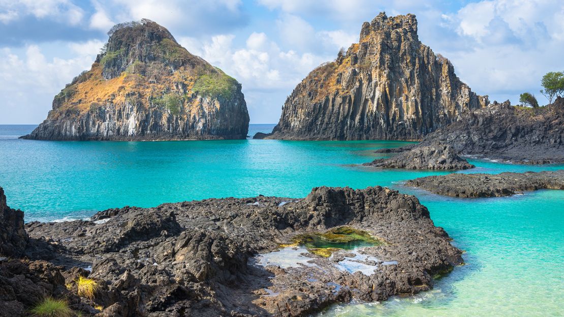 The Dois Irmaos rock formation presides over one of Brazil's most spectacular, if hard-to-reach, beaches.