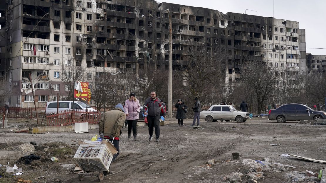 Civilians in Mariupol, Ukraine on March 20, 2022. Mariupol has come under heavy Russian shelling and air strikes. 