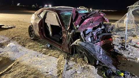 This photo released by the North Las Vegas Police Department shows a Dodge Challenger following the crash in North Las Vegas on January 29, 2022.