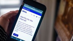 The Okta Inc. website on a smartphone arranged in Dobbs Ferry, New York, U.S., on Sunday, Feb. 28, 2021. Okta Inc. is scheduled to release earnings figures on March 3. Photographer: Tiffany Hagler-Geard/Bloomberg via Getty Images