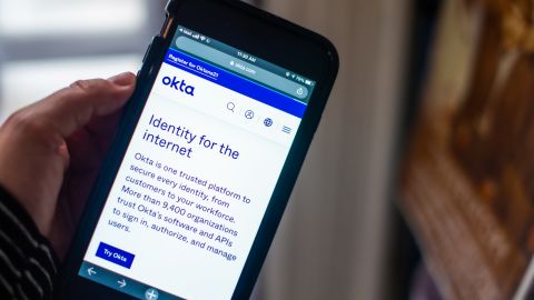 The Okta Inc. website on a smartphone arranged in Dobbs Ferry, New York, U.S., on Sunday, Feb. 28, 2021.