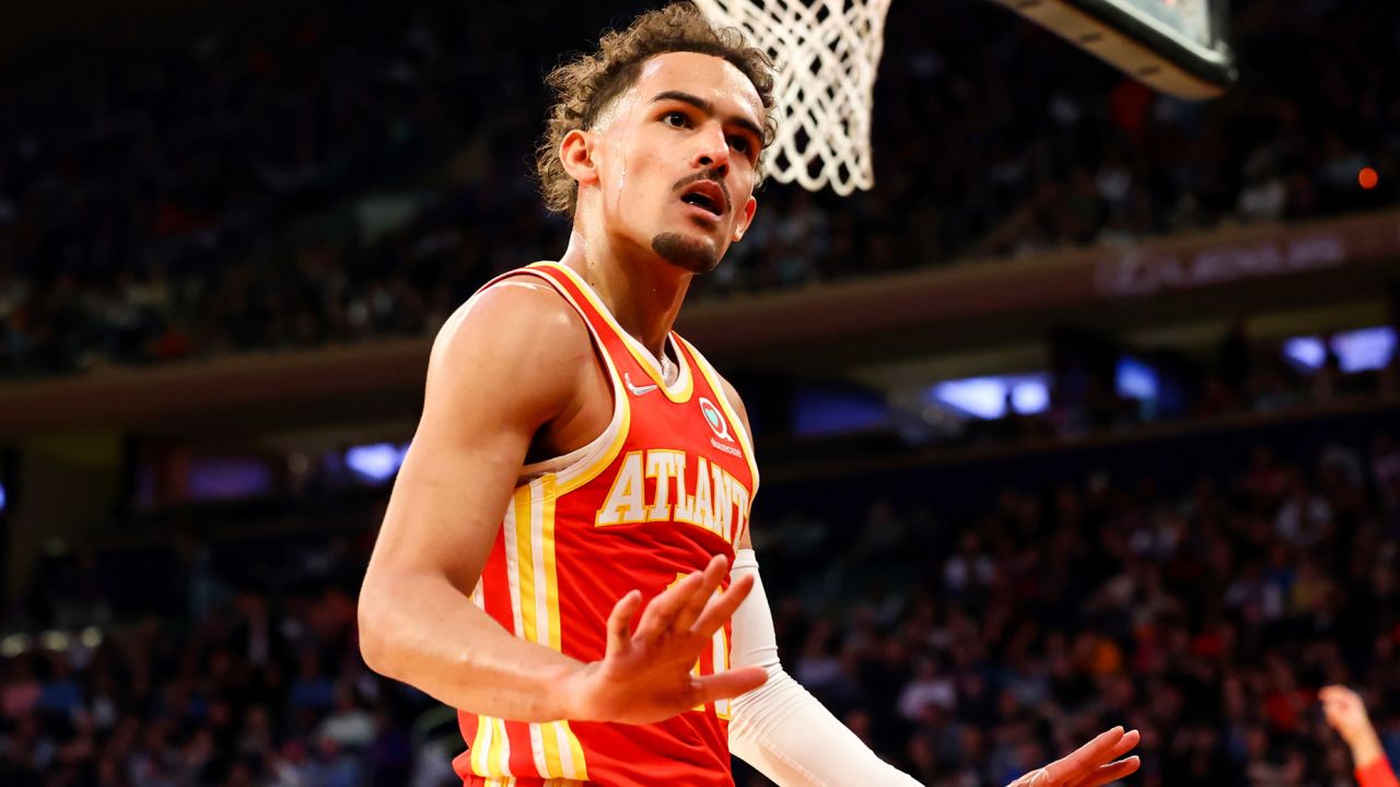 Trae Young motions to the crowd during the first half of the game against the New York Knicks.
