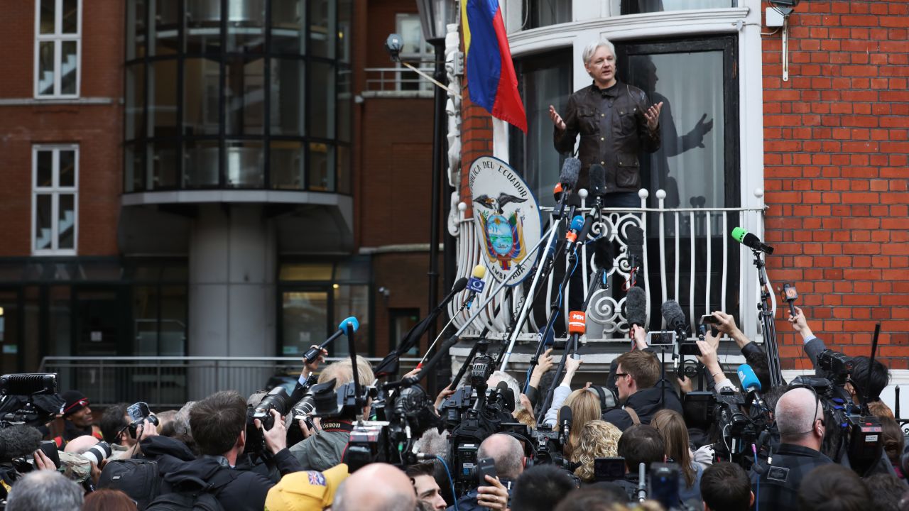 Julian Assange, founder of WikiLeaks, speaks to media and supporters from a balcony at the Ecuadorian embassy in London on Friday, May 19, 2017. 