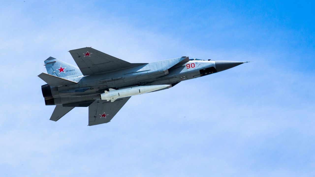 In a file photo taken on May 9, 2018, a Russian Air Force MiG-31K jet carries a high-precision hypersonic aero-ballistic missile Kh-47M2 Kinzhal during the annual Victory Day military parade in Moscow, Russia.