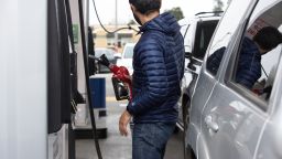 A customer refuels a vehicle at a Costco gas station in Federal Way, Washington, U.S, on Thursday, March 10, 2022. 
