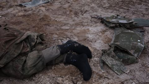 (EDITORS 'NOTE: Image contains graphic content) A view to a dead body of a Russian soldier lying on the road on March 5, 2022 in Sytniaky, Ukraine. 