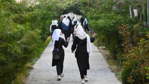 Girls arrive at their school in Kabul on March 23, 2022. (Ahmad Sahel Arman/AFP/Getty Images)