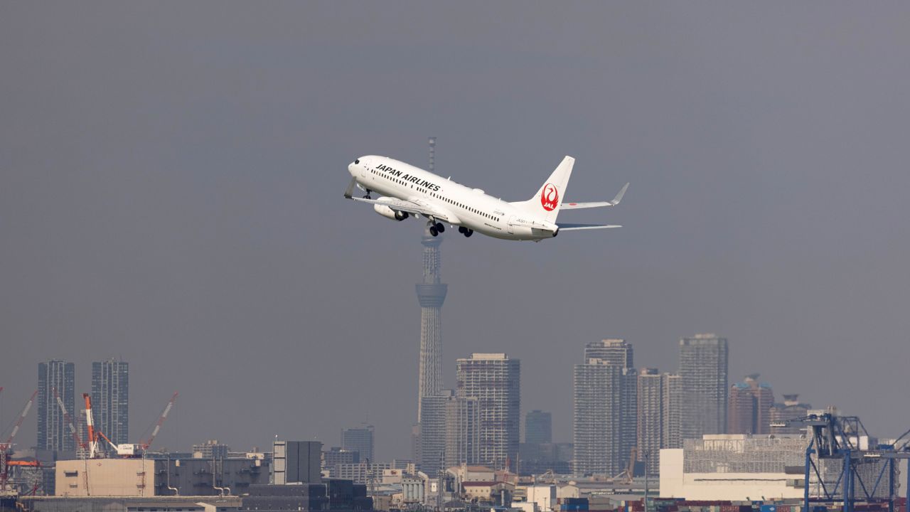 A Japan Airlines plane takes off from Haneda Airport Terminal 2 in Tokyo, Japan, on September 24, 2021.