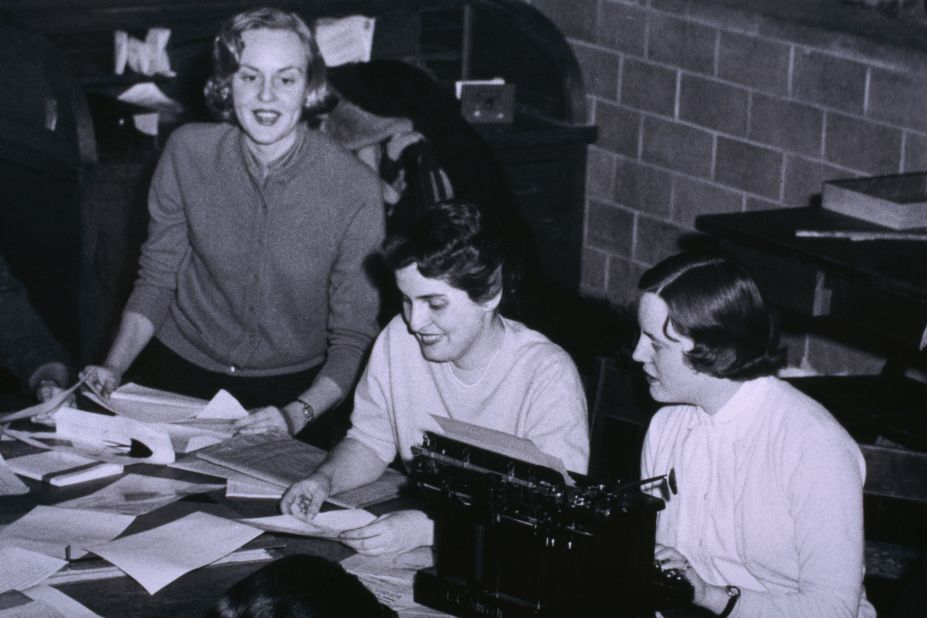Albright, center, works on the newspaper staff at Wellesley College in Massachusetts. She graduated in 1959 and later received a master's degree and a Ph.D from Columbia University.